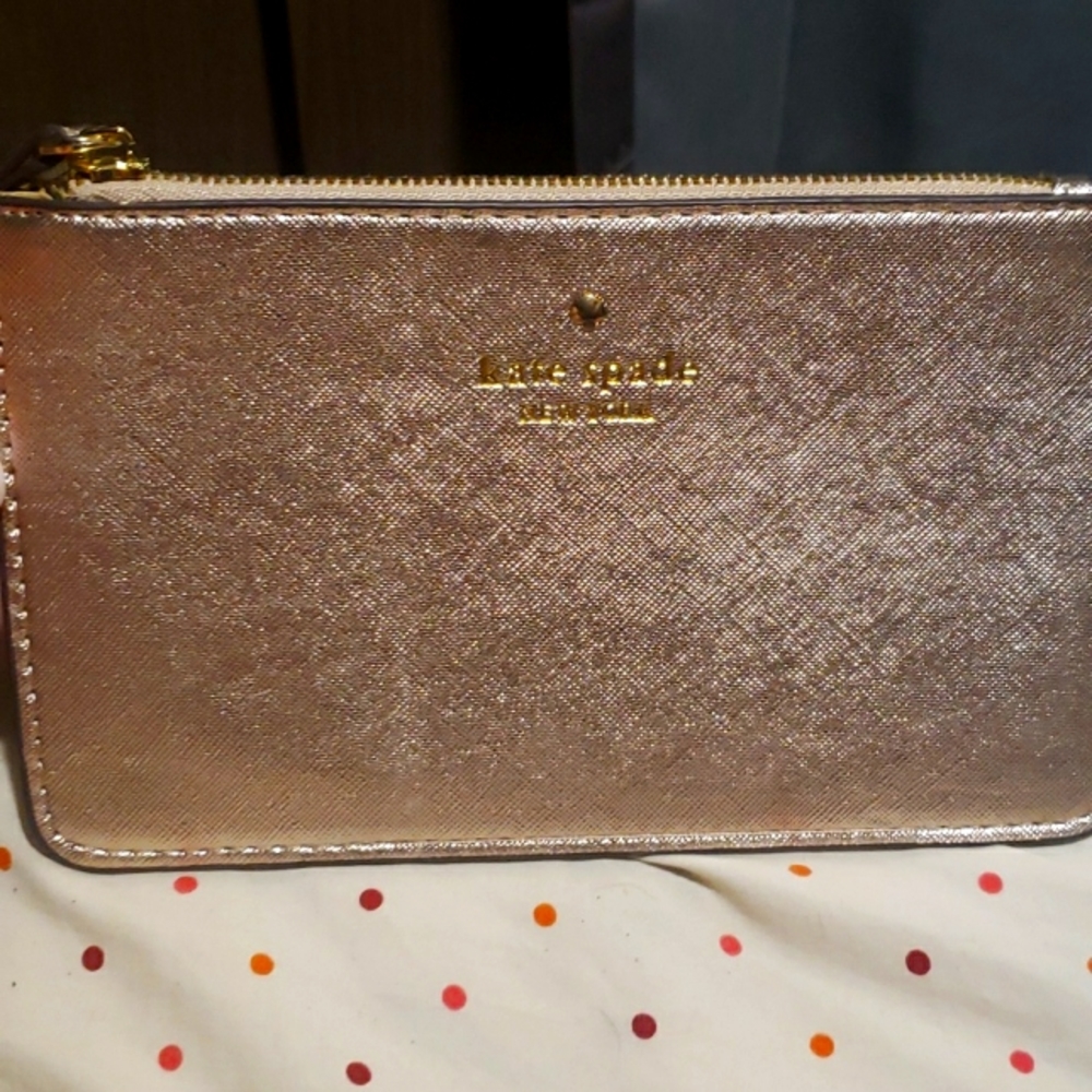 Ks spade wristlet..GET THIS AT THIS PRICE BEFORE ITS GONE